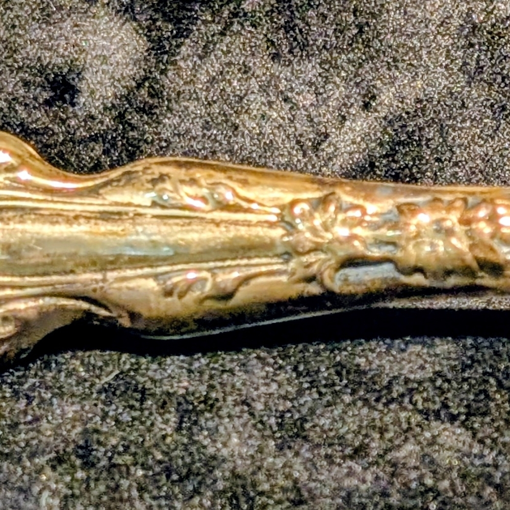 Ornate Gold Decorative Accent by [Brand]
